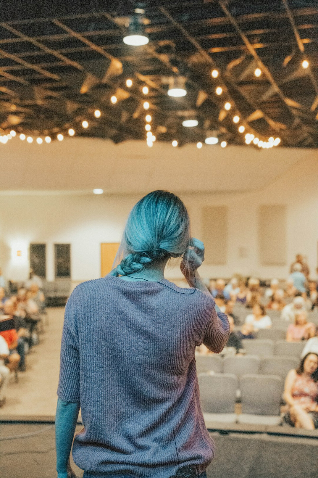 person presenting to audience